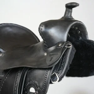 Black leather equestrian saddle with stitching.