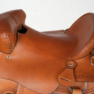 Brown leather horse saddle on white background.